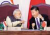 SCO बैठक में पीएम मोदी और शी जिनपिंग की मुलाकात, पास खड़े शहबाज को किया नजरअंदाज PM Modi and Xi Jinping shake hands