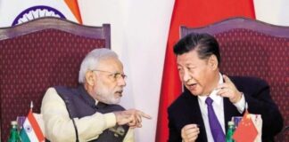 SCO बैठक में पीएम मोदी और शी जिनपिंग की मुलाकात, पास खड़े शहबाज को किया नजरअंदाज PM Modi and Xi Jinping shake hands